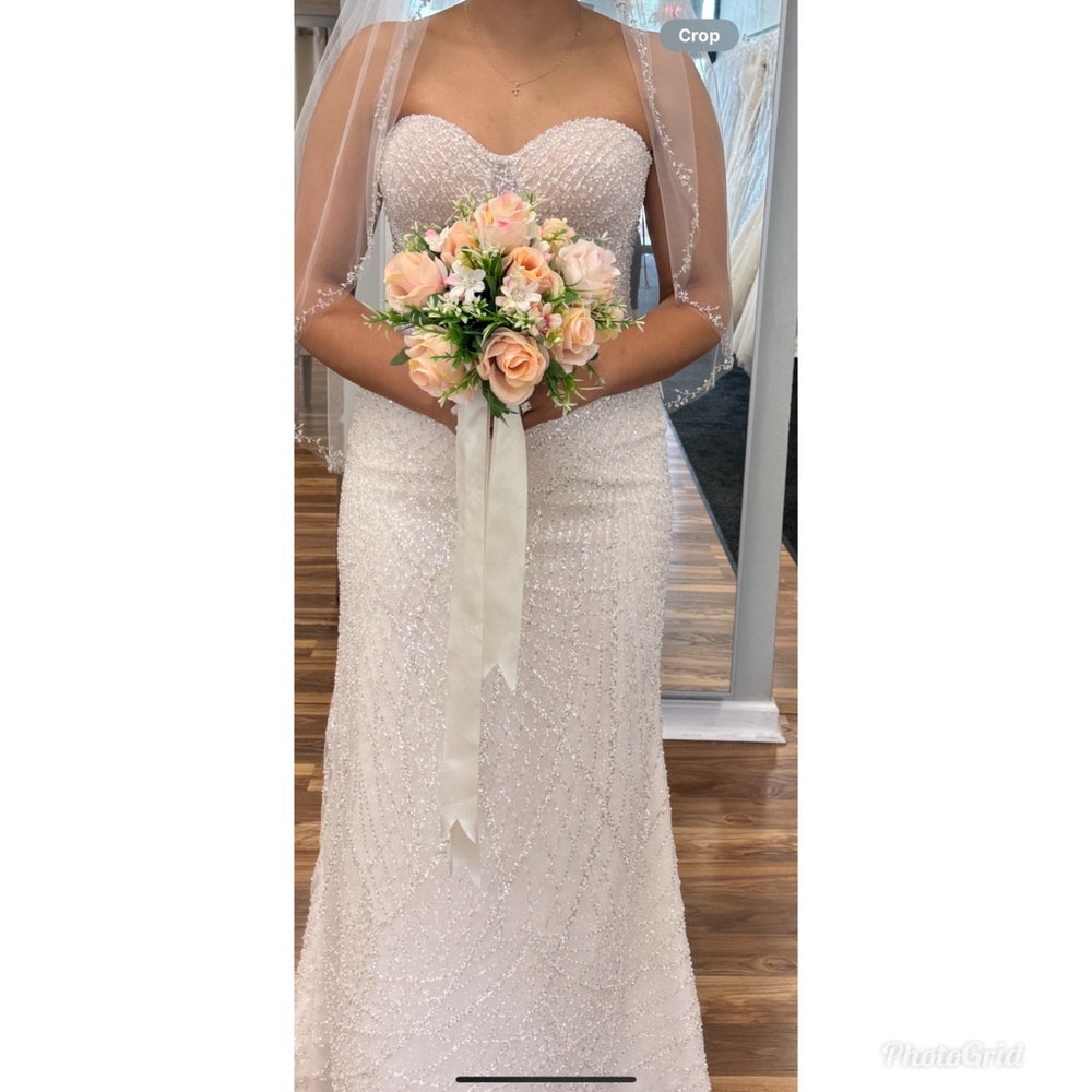 Nude color wedding dress.